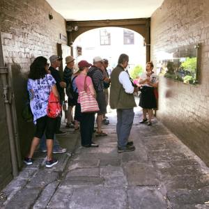a group of people standing in front of a building