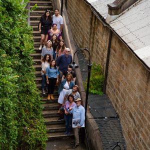 a group of people standing in front of a building