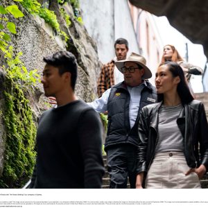 a group of people standing in front of a building
